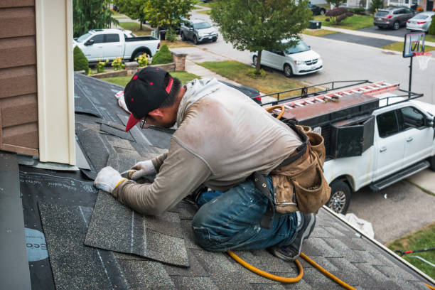 Professional Storm Damage Roof Repair technician working in Mendenhall, MS